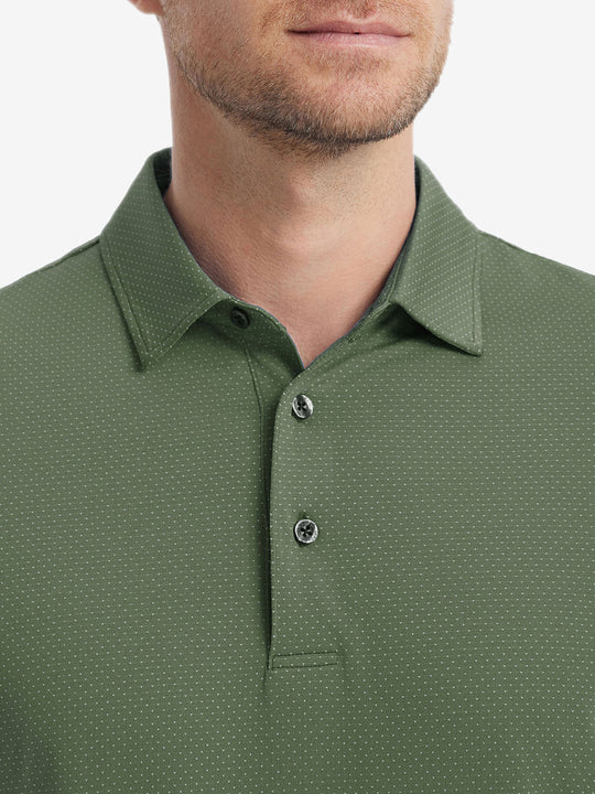 Close-up front shot from nose to chest of model wearing DARK GREEN 4 Way Stretch Jacquard Polo