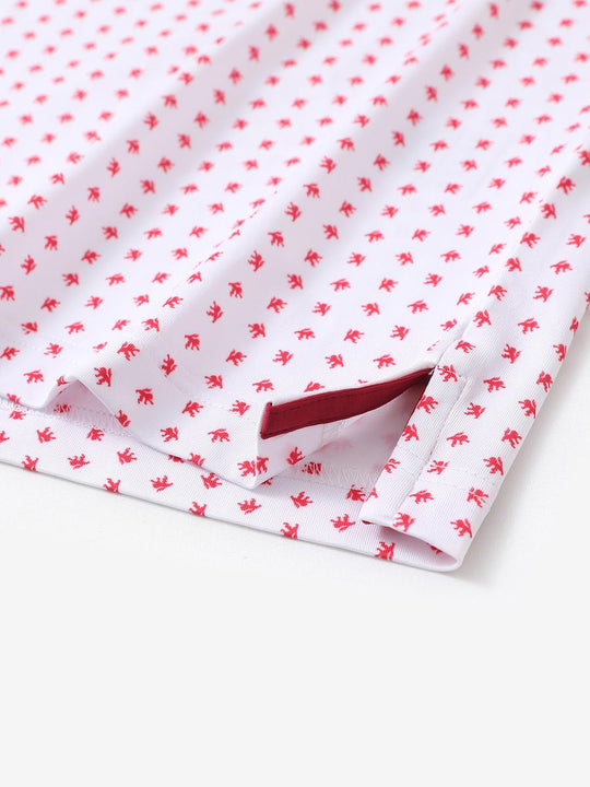 Hem slit detail of MAELREG Performance Jersey Print Polo in White Red Lion – comfort & movement