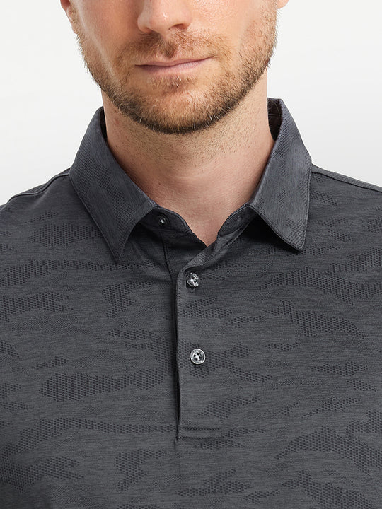 DARK GREY HEATHER Camo Heather Jacquard Polo front view from nose to chest of model