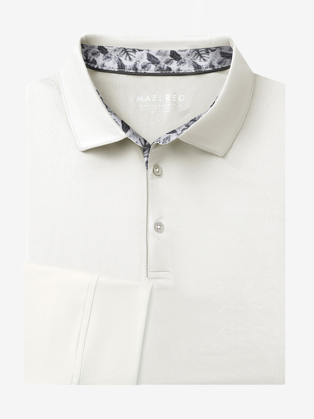 Folded view of CREAM Long Sleeve Solid Jersey Polo showing fabric texture and neat folds