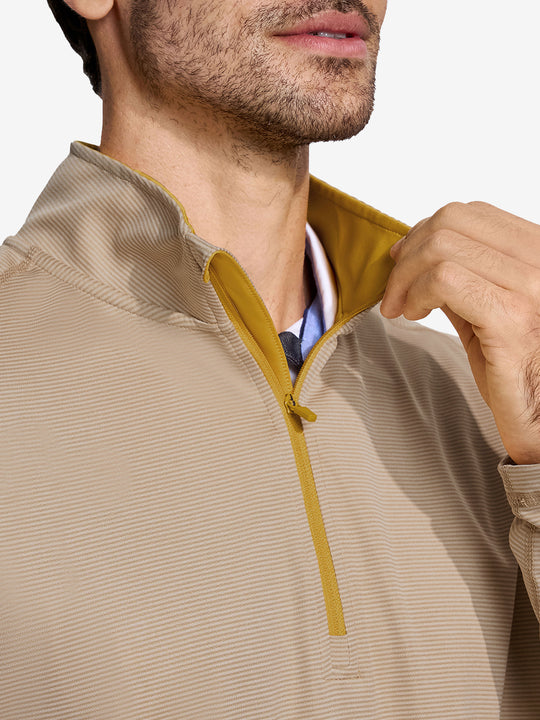 Front view from nose to chest of model wearing Pinstripe Quarter Zip Pullover – APRICOT MELANGE