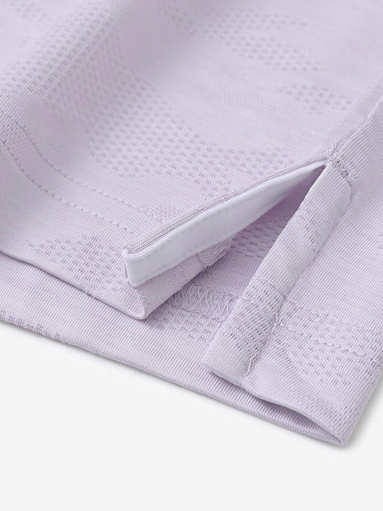 LAVENDER HEATHER Camo Heather Jacquard Polo close-up of shirt hem slit detail