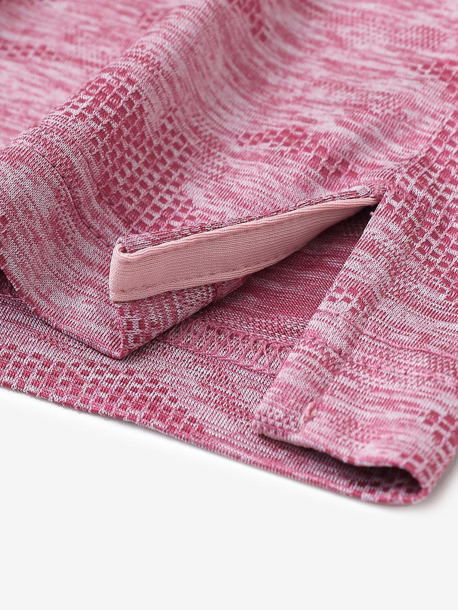 DUSTY ROSE HEATHER Camo Heather Jacquard Polo close-up of shirt hem slit detail