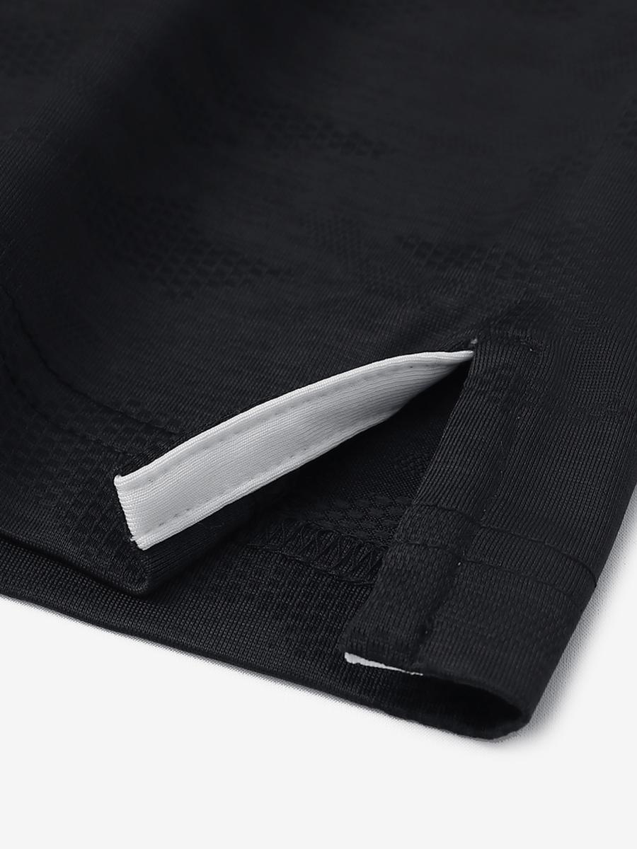 BLACK HEATHER Camo Heather Jacquard Polo close-up of shirt hem slit detail
