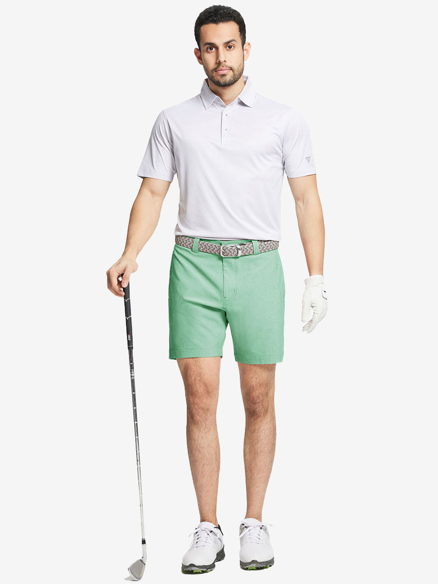 Full body front view of model wearing MINT GREEN 7 Inch Heather Performance Golf Shorts, holding a golf club