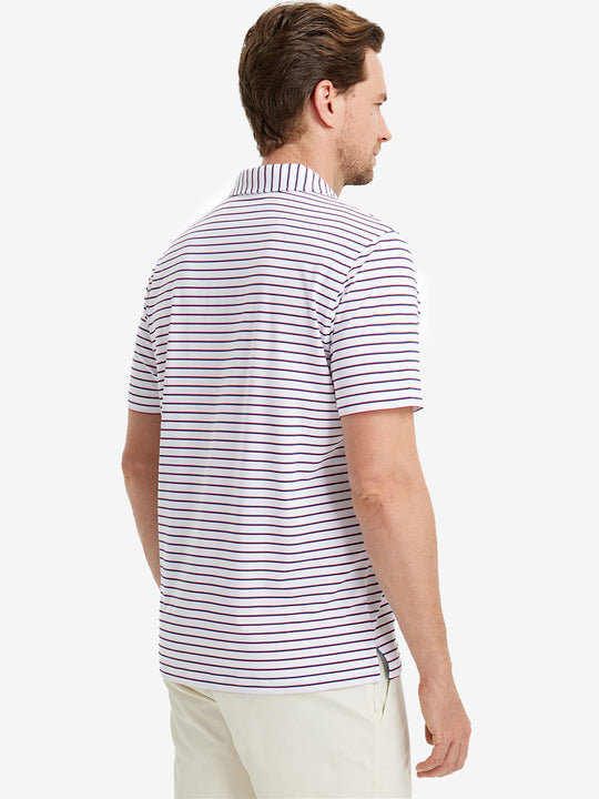 Model holding golf club in WHITE/NAVY STRIPE Polo — classic sporty look