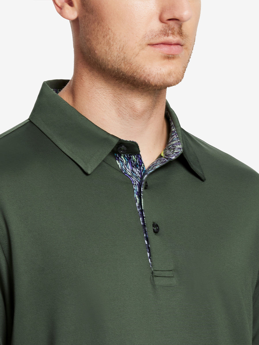 Male model wearing the Olive Green Everyday Classic Solid Polo, front view from nose to chest