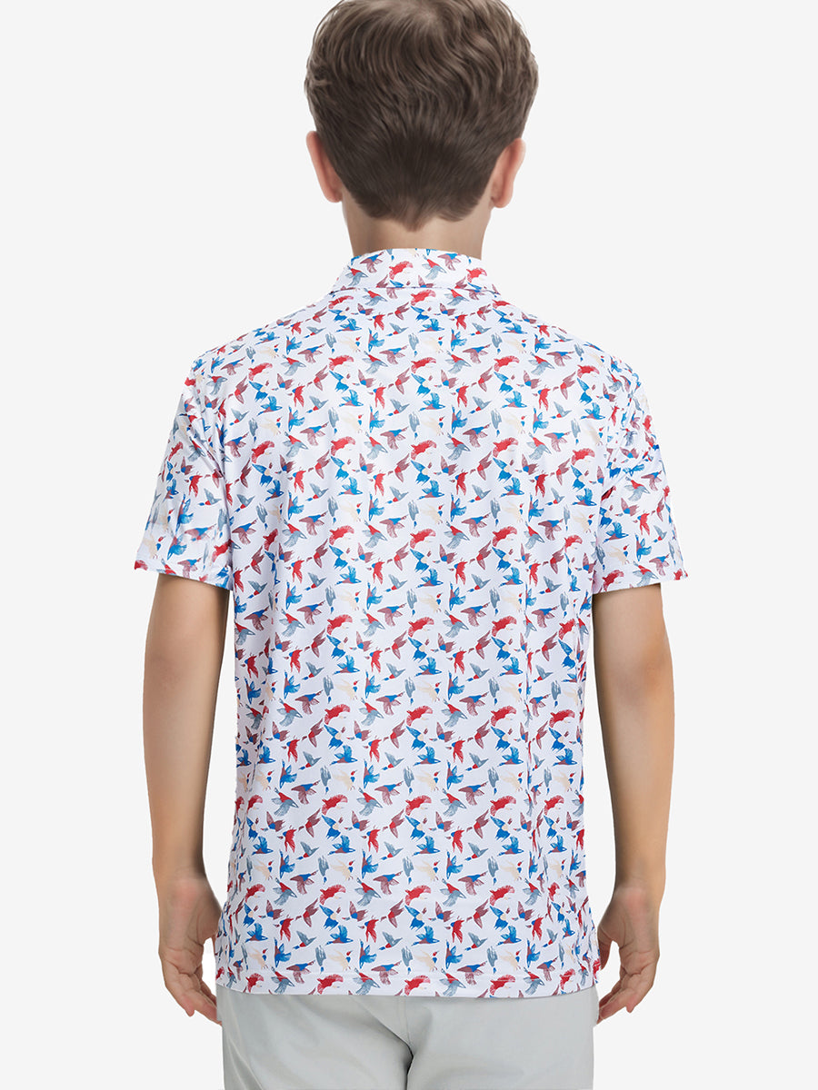 Back half-body view of boy wearing COLORFUL WILD GOOSE Performance Print Boys Golf Polo outdoors