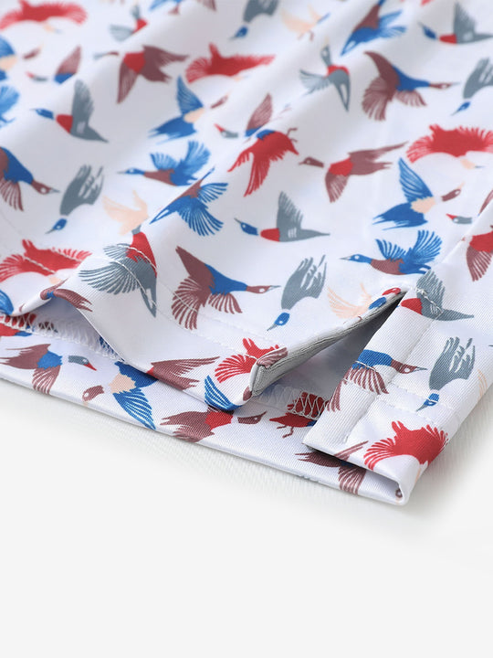 Hem slit detail of MAELREG Performance Jersey Print Polo in Colorful Wild Goose – comfort & movement