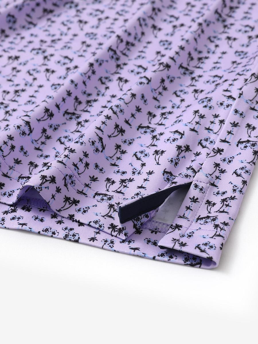 Hem slit detail of MAELREG Performance Jersey Print Polo in Lavender Seaside Palm – comfort & movement