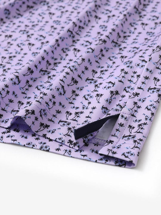 Hem slit detail of MAELREG Performance Jersey Print Polo in Lavender Seaside Palm – comfort & movement