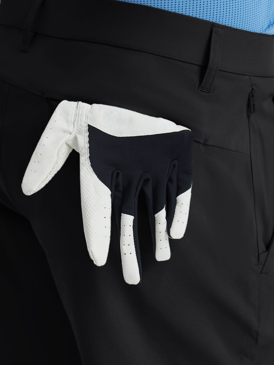 Close-up of right front pocket with zipper being opened on Player Fit Versatile Solid Shorts 9 Inch – BLACK
