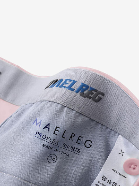 Interior waistband with MAELREG label and sizing – Pink shorts, 9 Inch