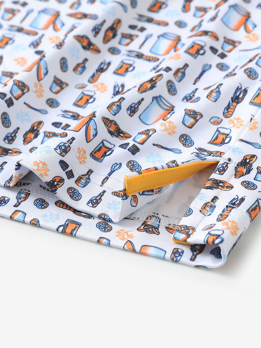 Hem slit detail of MAELREG Performance Jersey Print Polo in White Orange Picnic – comfort & movement