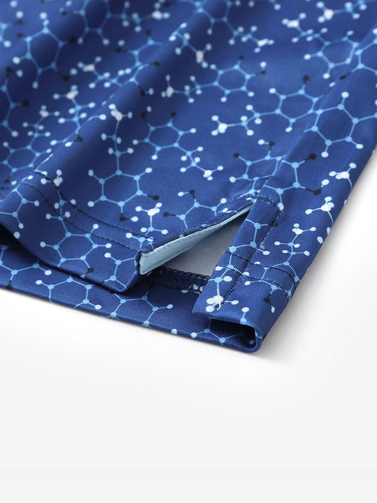 Side slit detail on BLUE MOLECULAR STRUCTURE polo showing clean stitching and breathability