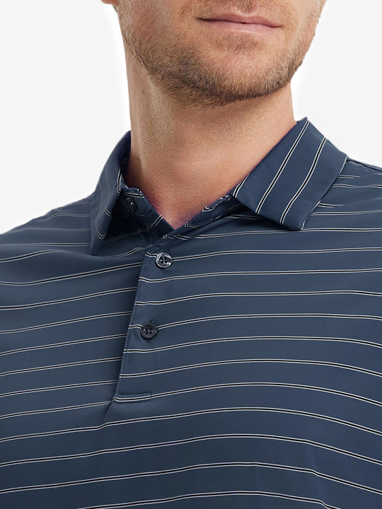 Model front view from nose to chest wearing NAVY STRIPE Water Resistant Stripe Nylon Polo