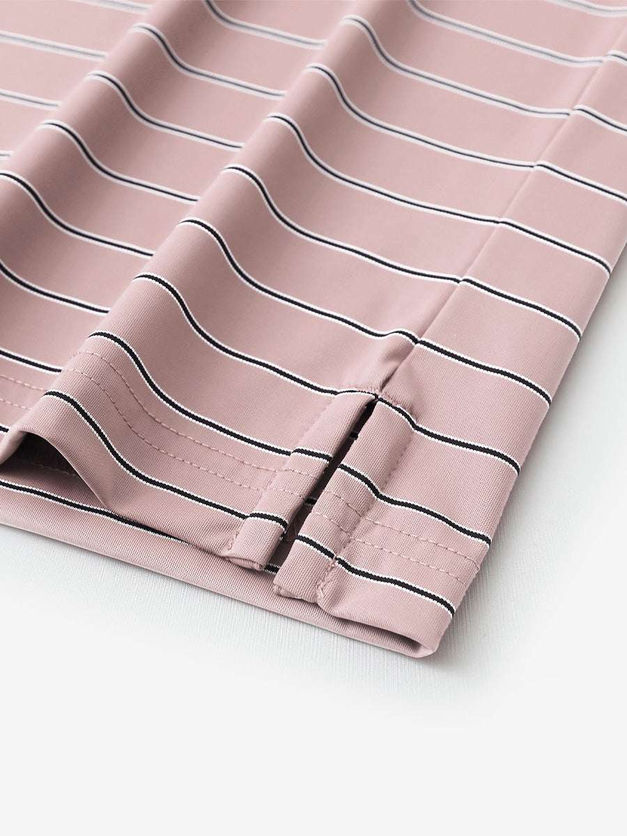 Close-up of side slit detail on Water Resistant Stripe Nylon Polo in Pale Pink Stripe.