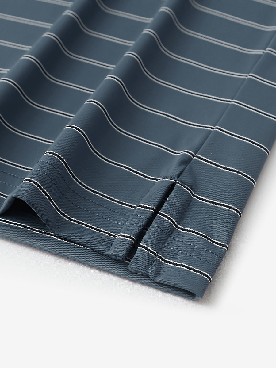 Close-up of side slit hem detail on DARK SLATE BLUE STRIPE Water Resistant Stripe Nylon Polo