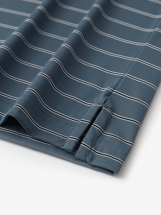 Close-up of side slit hem detail on DARK SLATE BLUE STRIPE Water Resistant Stripe Nylon Polo