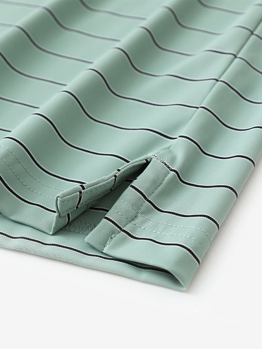 Close-up of side slit hem detail on LIGHT GREEN STRIPE Water Resistant Stripe Nylon Polo