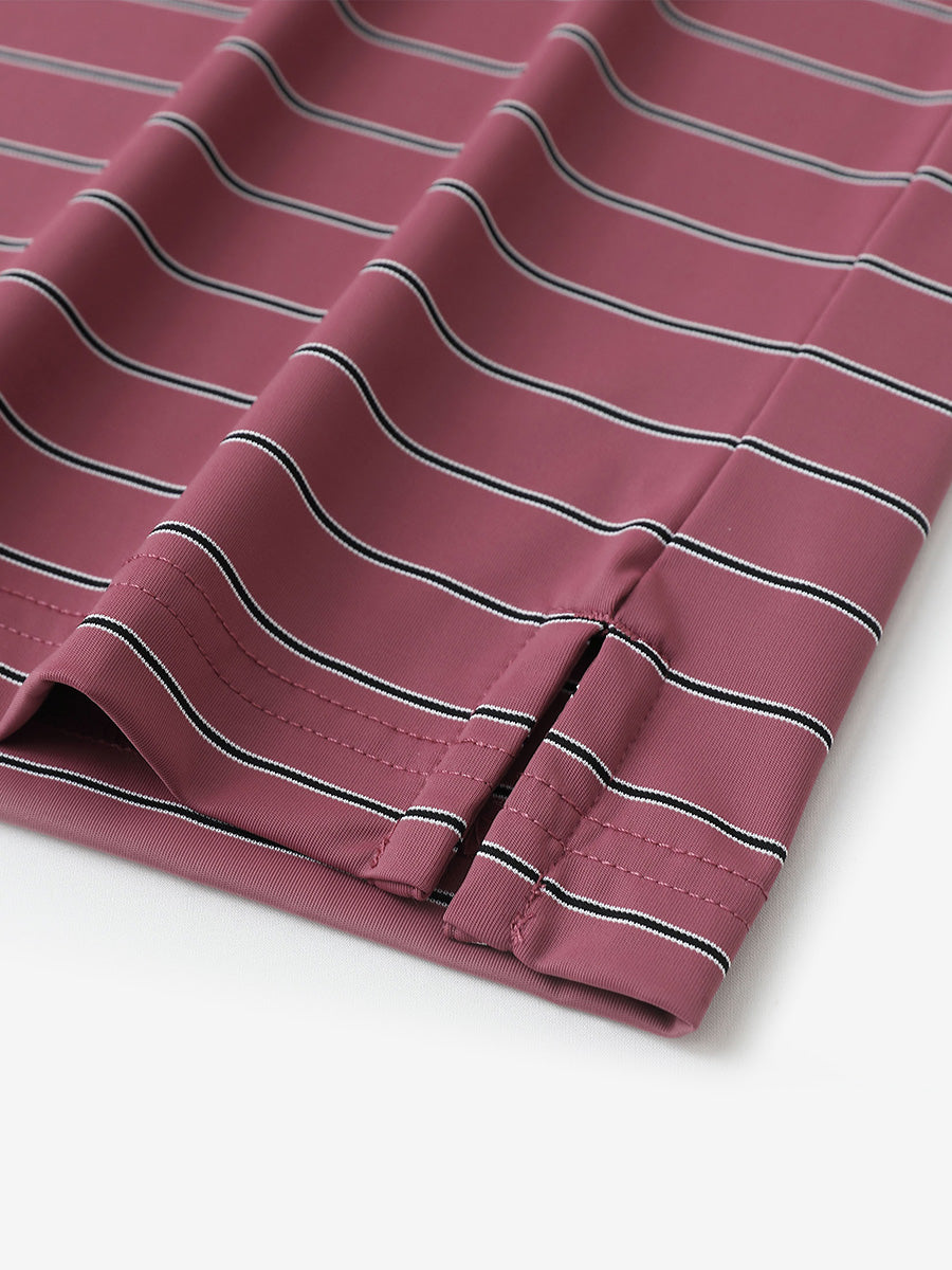 Close-up of side slit detail on Water Resistant Stripe Nylon Polo in Beet Red Stripe.