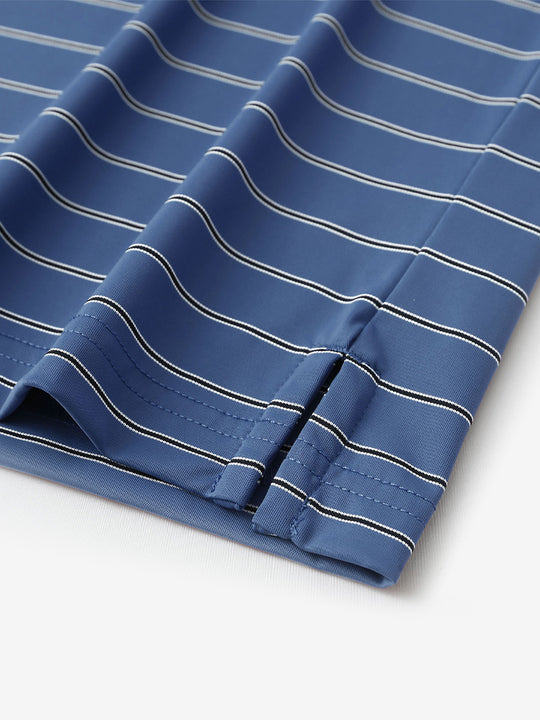 Close-up of side slit detail on Water Resistant Stripe Nylon Polo in Blue Stripe.