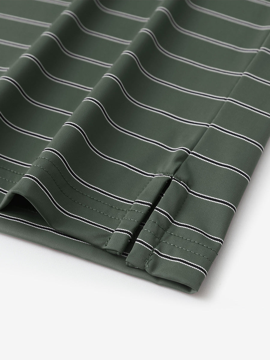 Close-up of side slit hem detail on BLACKISH GREEN STRIPE Water Resistant Stripe Nylon Polo